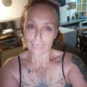 portrait de Purpple Femme de 49 ans