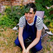 portrait de Asel Non binaire de 44 ans